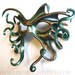 Large Cthulhu leather mask, hand-painted in metallic green and copper