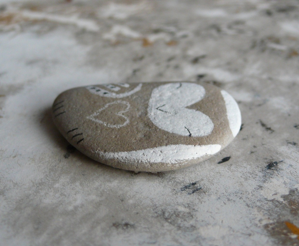 Flat Beach Stone Owl with a Heart