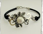 Sterling silver leaves with pearl on a black leather string bracelet , June birthstone - Crazy love.