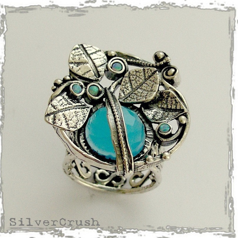Floral sterling silver cocktail gemstone ring with blue ocean quartz and blue opals - Looking in.
