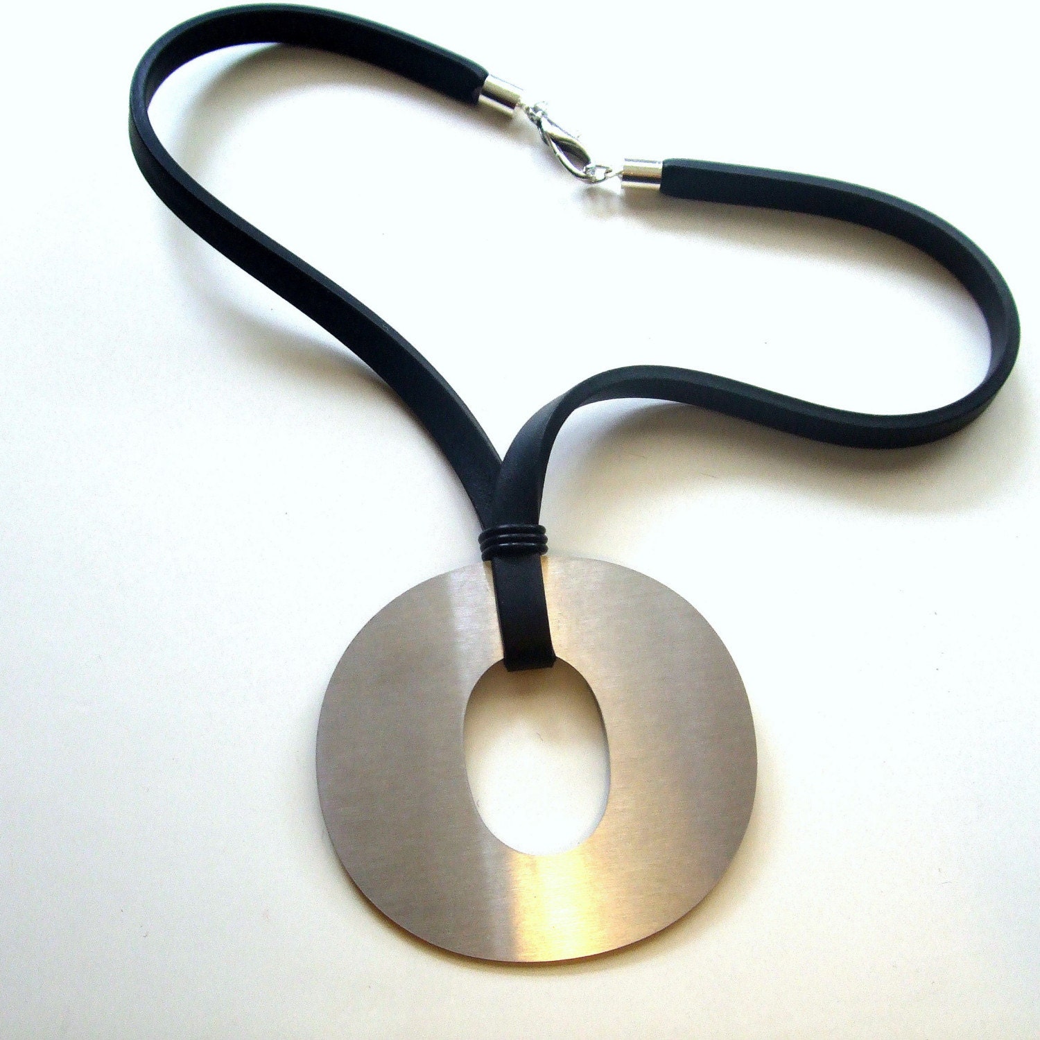 modern pendant,  tribal influence, stainless steel geometric necklace, designer jewelry by frankideas, contemporary big jewellery, statement