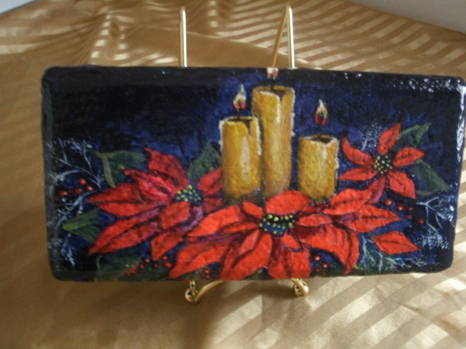 Red Poinsettia And Candles Painted On Brick