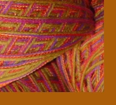 Yarn:  200 yards Ginger Snaps golden brown wool yarn with pink purple orange, worsted bulky, by dj runnels