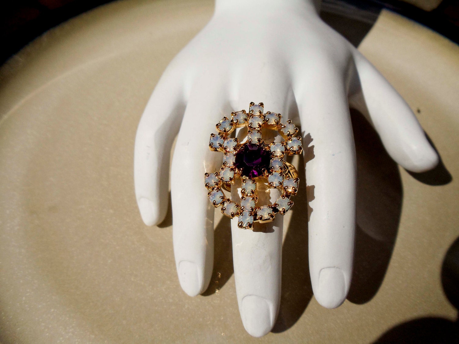 Vintage Sarah Coventry Gold ring with purple and white stones