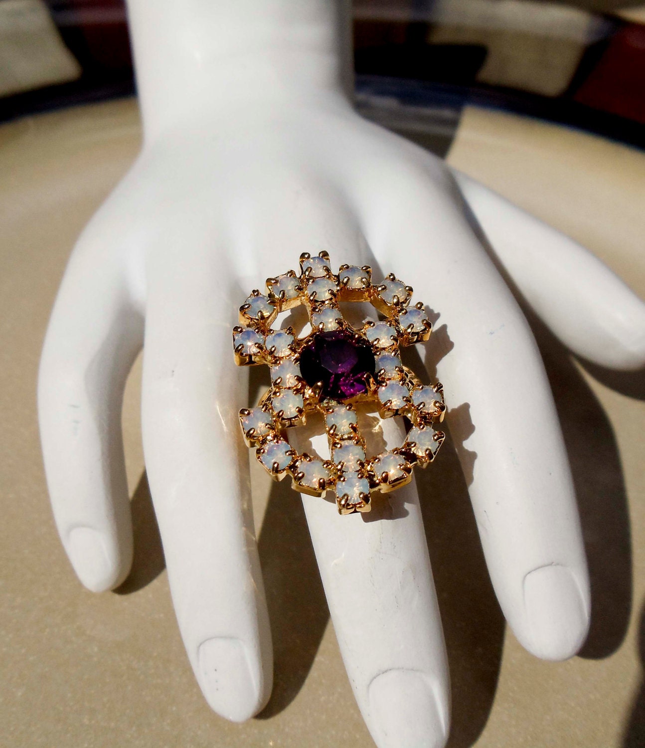 Vintage Sarah Coventry Gold ring with purple and white stones