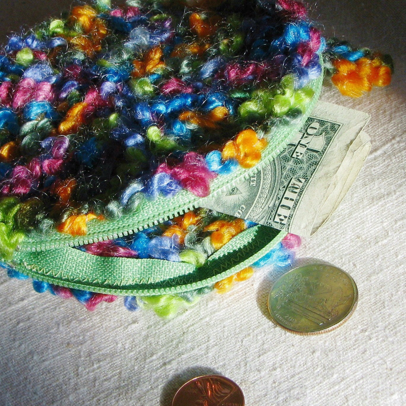 Round coin purse with zipper, crocheted in green purple orange and blue confetti mix, 4.25 inch