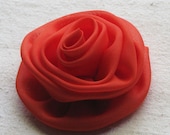 Rose hair clip, in bright persimmon orange fabric, 3 inch