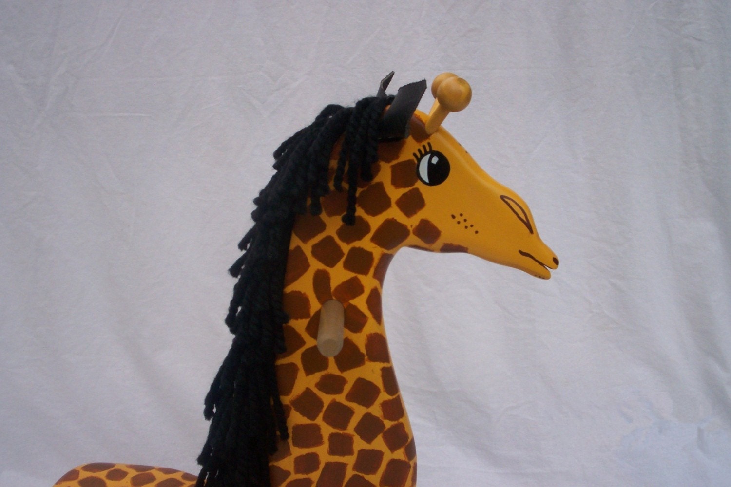 wooden rocking horse or giraffe