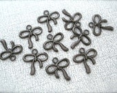 10 Gunmetal Bow Charms Pendants