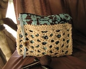 Crocheted floral lined makeup bag