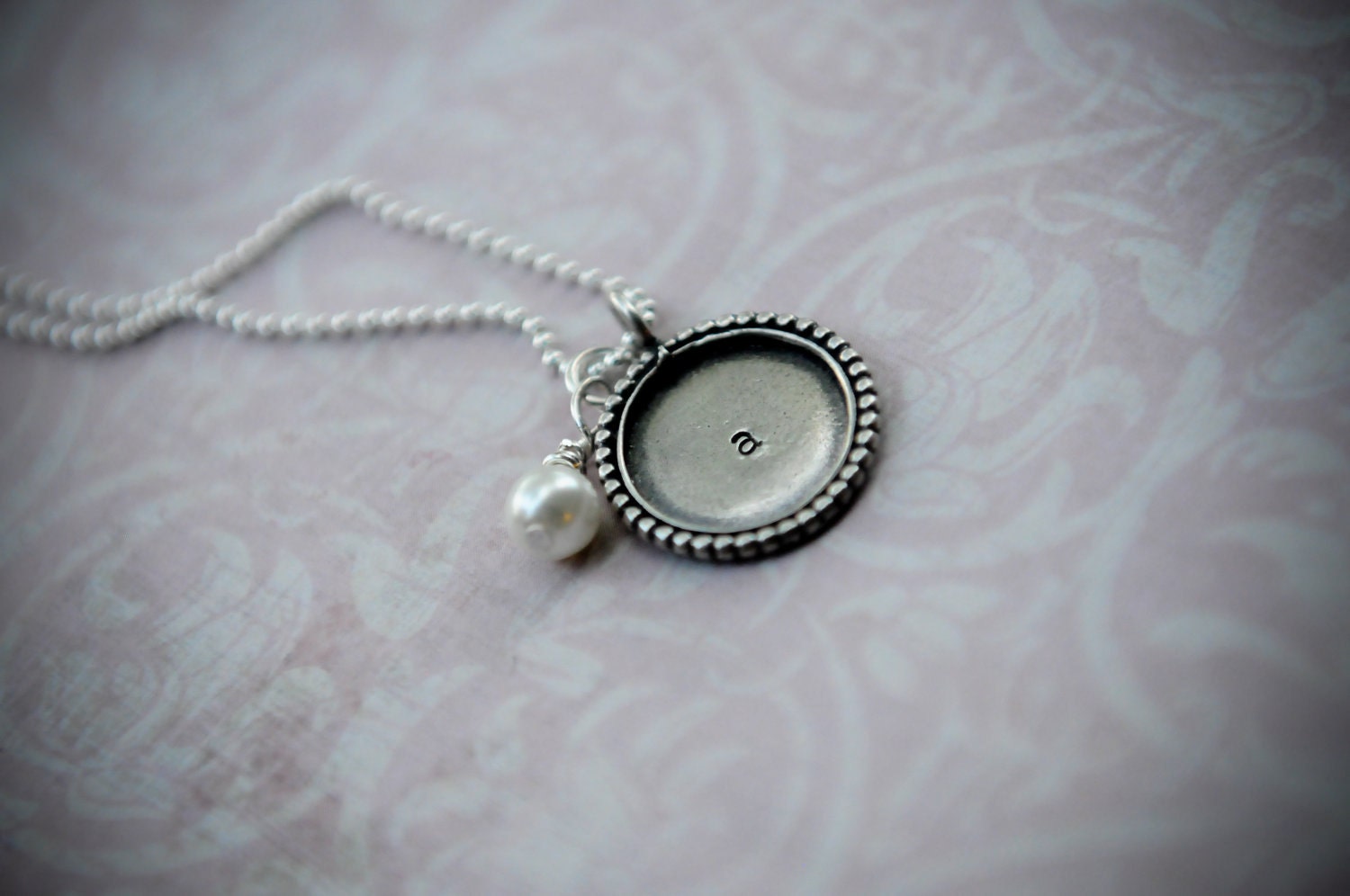 Hand Stamped Sterling Silver Disc with a Dotted Edge with a Pearl on a Chain - Dots
