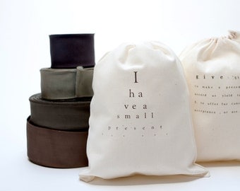 2 cotton bags with text