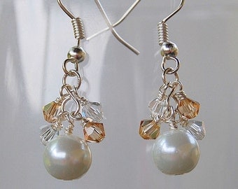 Pearl and swarovski earrings