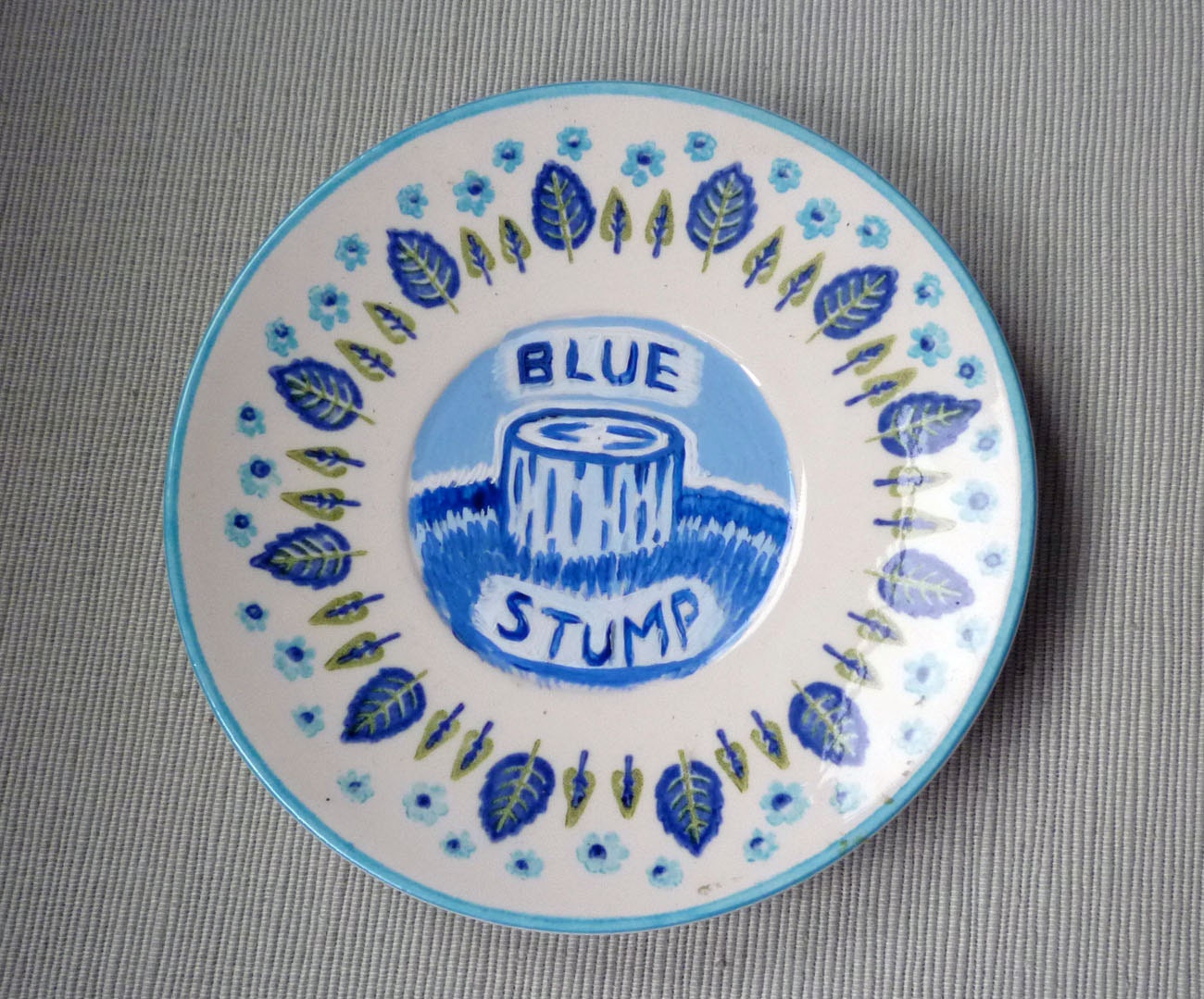 blue stump hand painted plate