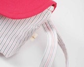 Clutch handbag- pink and black stripe with faded red accent flap wristlet