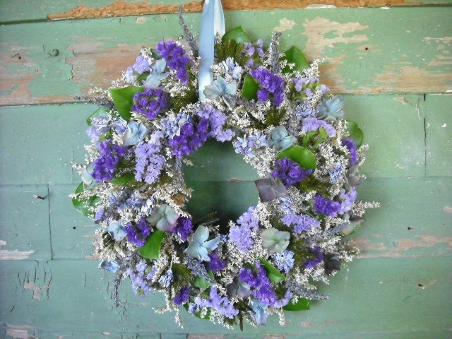 Dried flower wreath in shades of violet, blue and lavender.