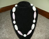 Lavender and grey necklace of ceramic and pearl beads.