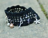 Crocheted Black bracelet with charms. Unisex. Ready to ship.