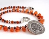Tribal necklace of garnets, carnelian, and silver