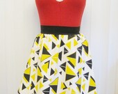 Fun and Flirty White Circle Skirt with Black and Yellow Abstract Design
