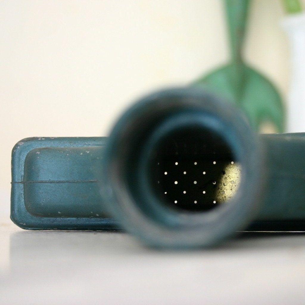 Vintage sprinkler head blue and brass for your springtime gardening needs