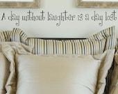 A Day Without Laughter Is A Day Lost vinyl lettering wall saying home decor quote decal  4x31