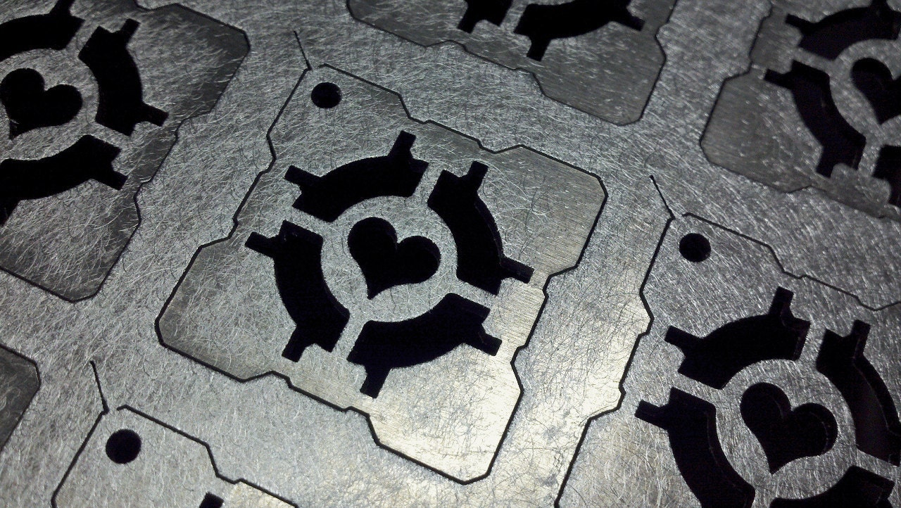 Pendant to honor your lost Weighted Companion Cube