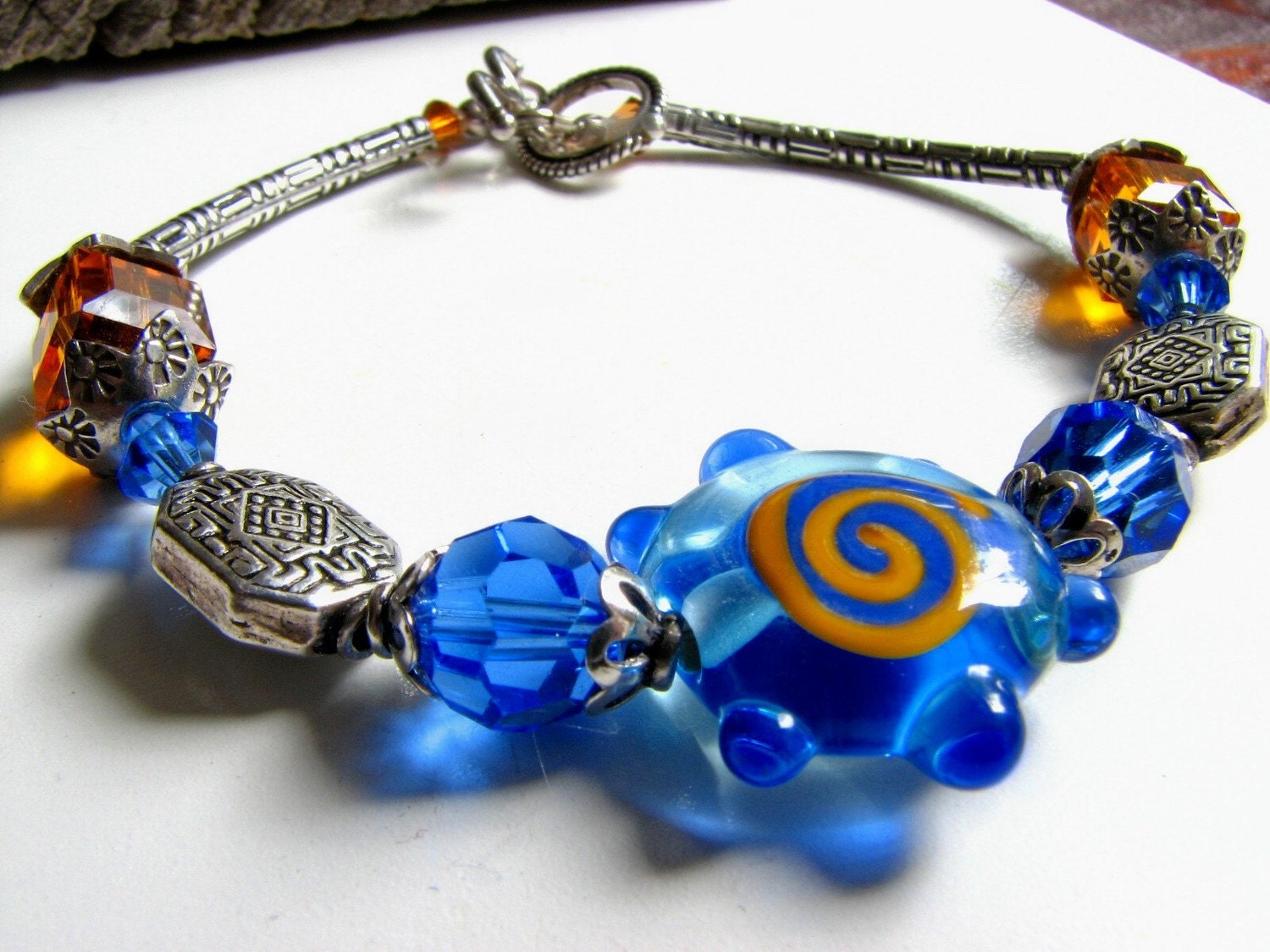 Copper Blues Bracelet, Lampworked Blue and Copper Flower, Sterling Silver, Swarovski Crystal, Sterling Jewelry