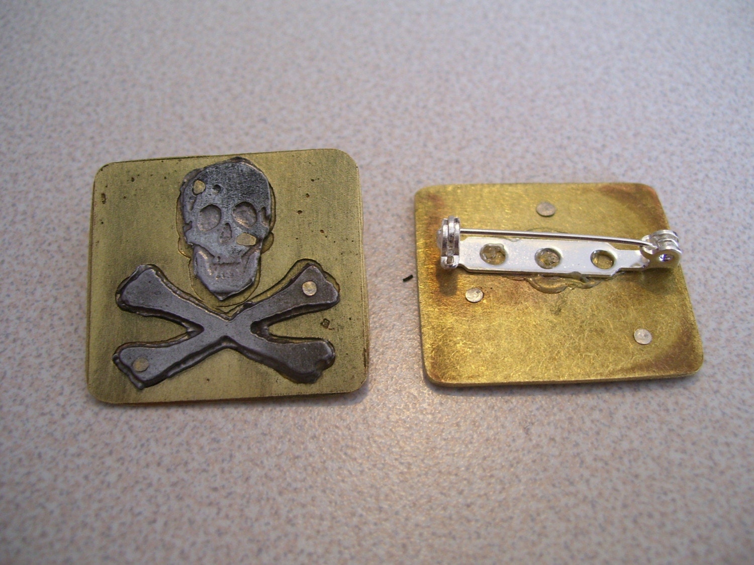 Steel and Brass Skull and Crossbones Pin