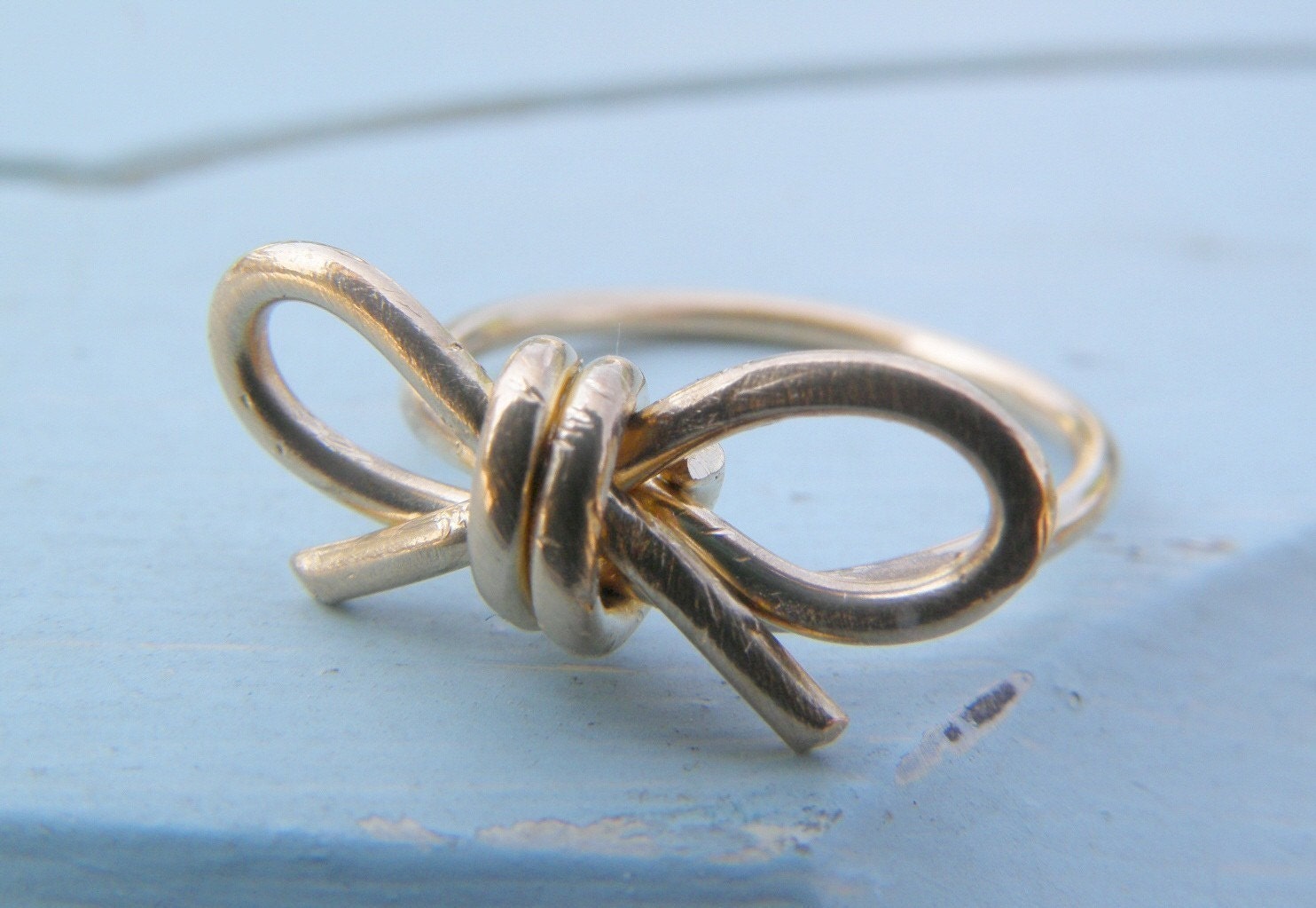DON'T FORGET. 14 K gold filled wire bow  ring in your size