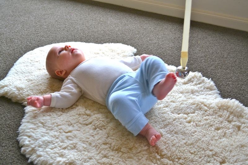 Bell on a Ribbon, Montessori baby mobile for grasping