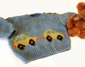 Knitting Pattern for a Babies Sweater with Intarsia Motif