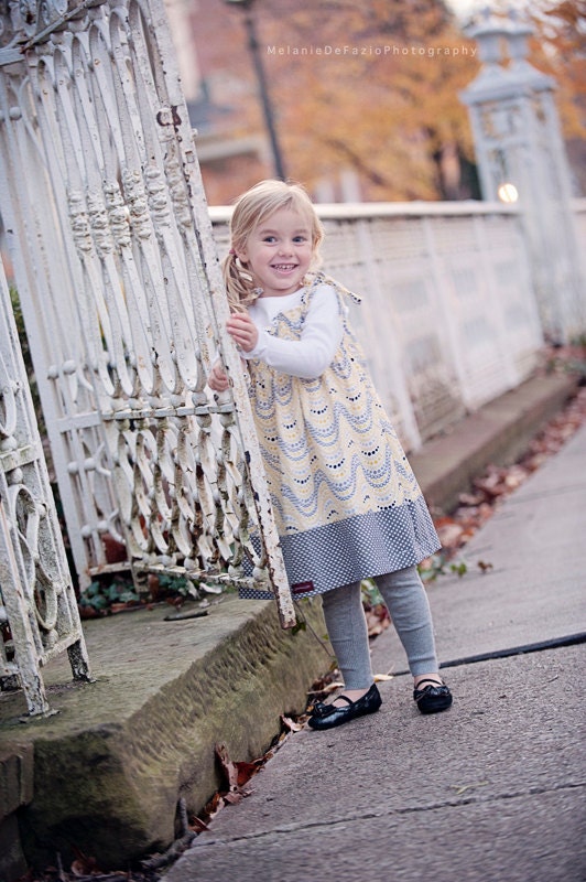 The yellow and grey polka dot Smocked Dress... handmade childrens clothing by laken and lila