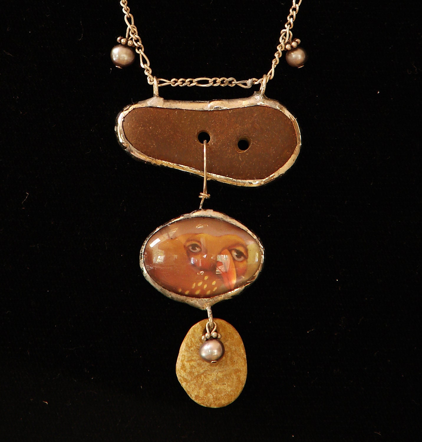 one of a kind fine art pendant with silver solder