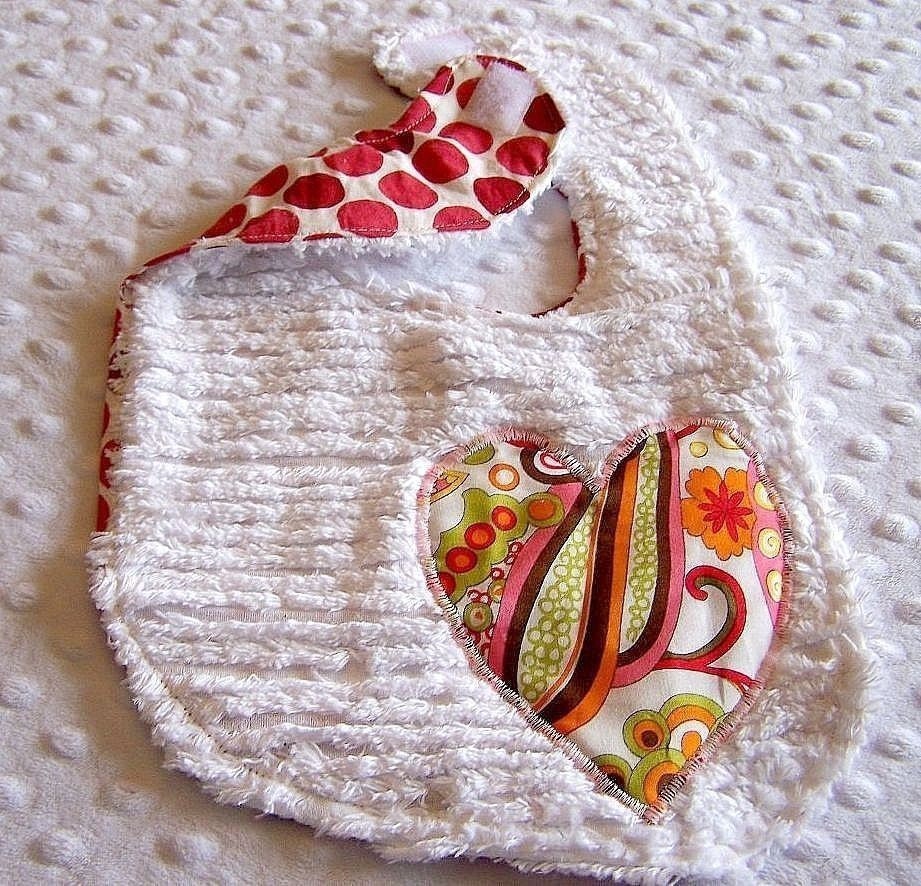 Heart Bib in Funky Floral Mirabella Print with Bright Red Polka Dot Back