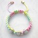 Friendship bracelet rainbow pastels macrame rhinestone disco ball beads