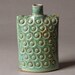 Stoneware oval flask bottle vase in blue-green embossed dots