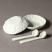 Pair of little salt cellar or teabag holders with matching miniature porcelain spoons