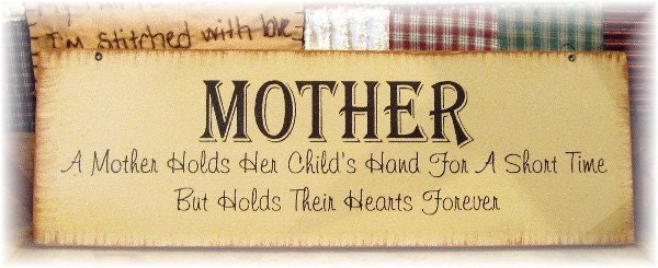 MOTHER A mother holds her child's hand for a short time but holds their hearts forever primitive wood sign