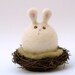 Easter Bunny Toy sitting on her nest . Very sweet and VERY cute . Needle Felted Wool