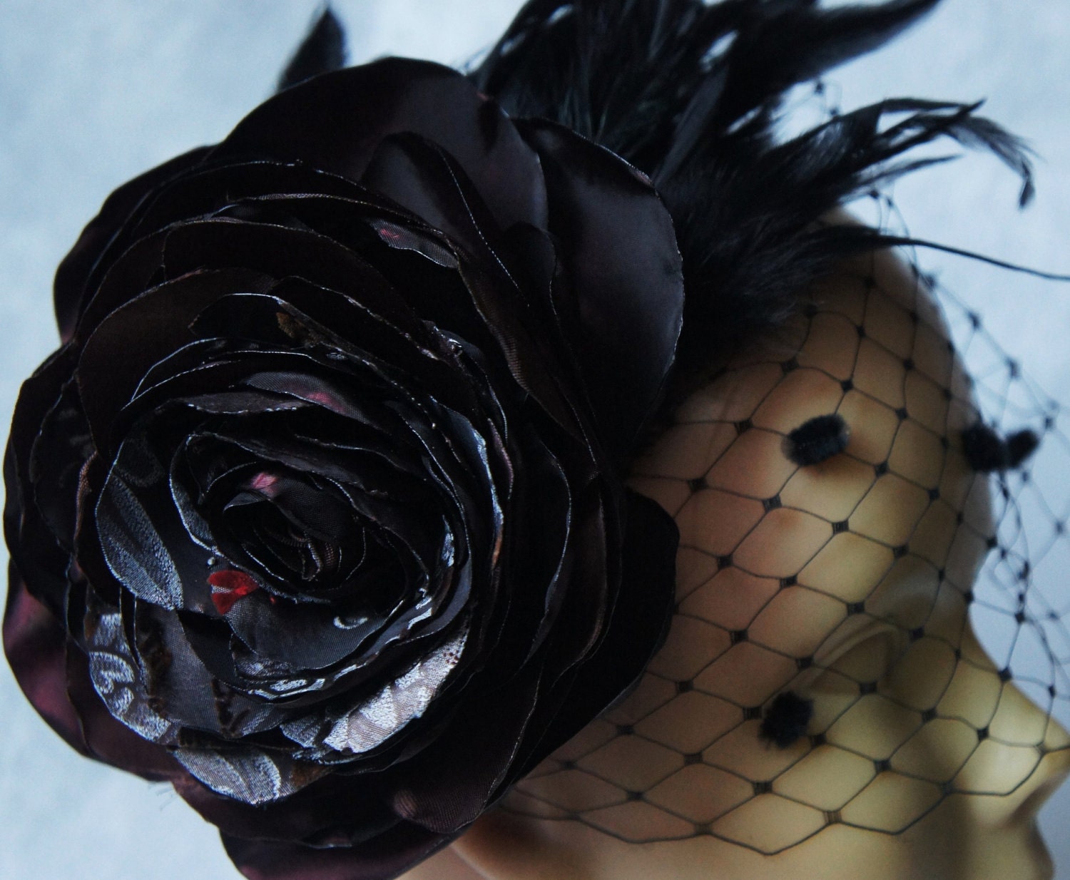 Black and deep red recycled vintage fabric flower headpiece/fascinator with recycled cockerel feathers and birdcage veil