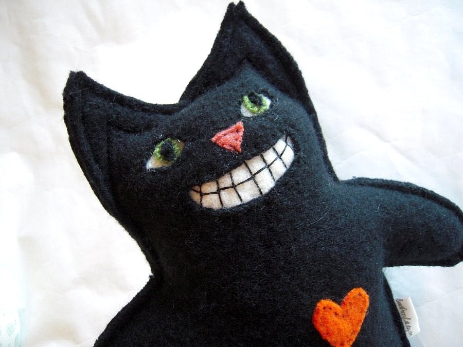 Just in time for Halloween a black upcycled sweater cat