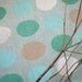 Bird Egg linen tea towel on aqua
