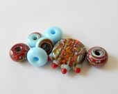 Natural Against The Sky Lampwork Glass Beads Set of 7 focal and spacers or accents Sky Blue, Red, Homemade Frit