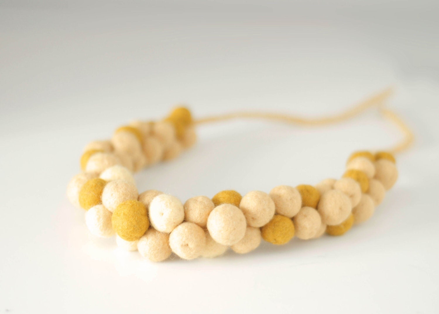 Felt statement necklace, unique fashion necklace in golden yellow