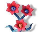 Flowers with eyes and nose  sculpture