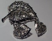 Vintage rhodium finish TRIFARI leaf set pin with baguette rhinestones  and clip on earrings