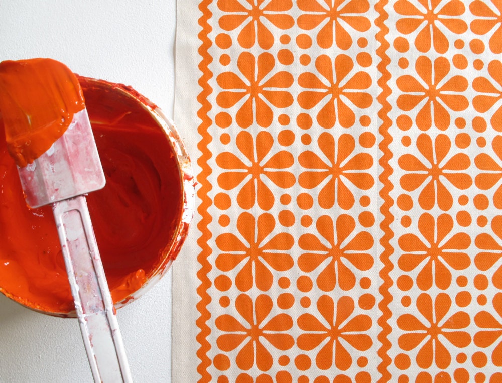Parade print in Orange on Organic Cotton