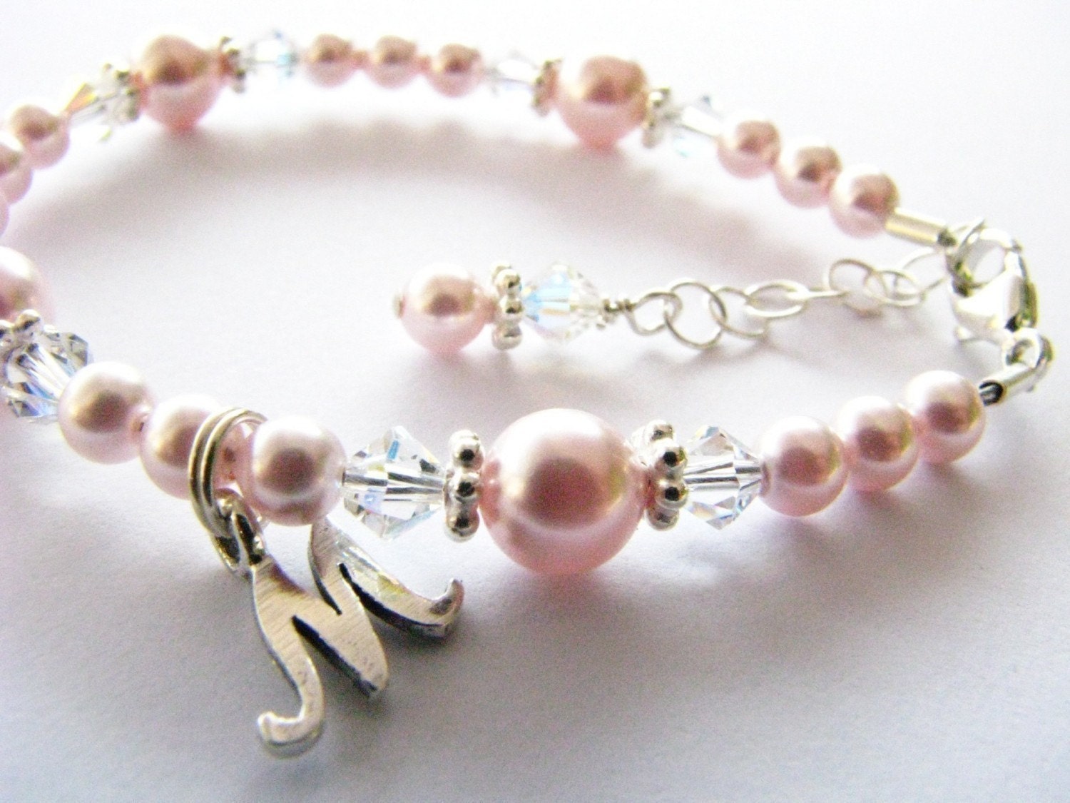 Baby bracelet with an initial...flower girl baby newborn  toddler girl personalized light pink pearl and crystal bracelet