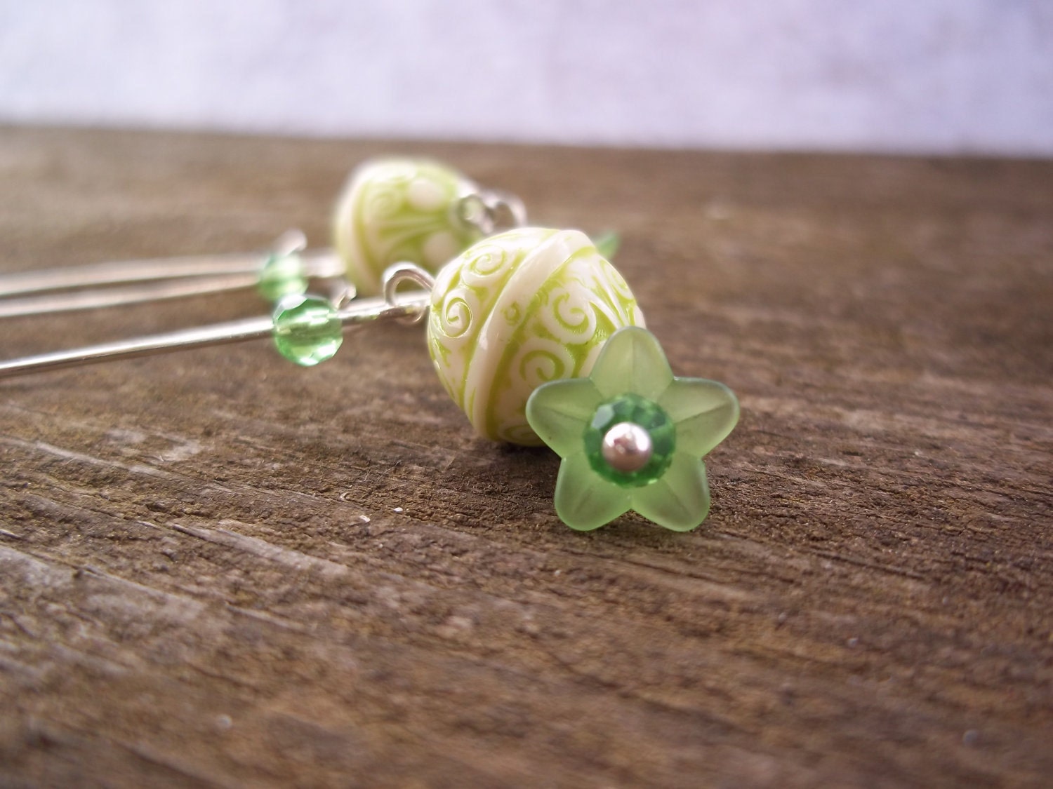 Green floral dangle earrings